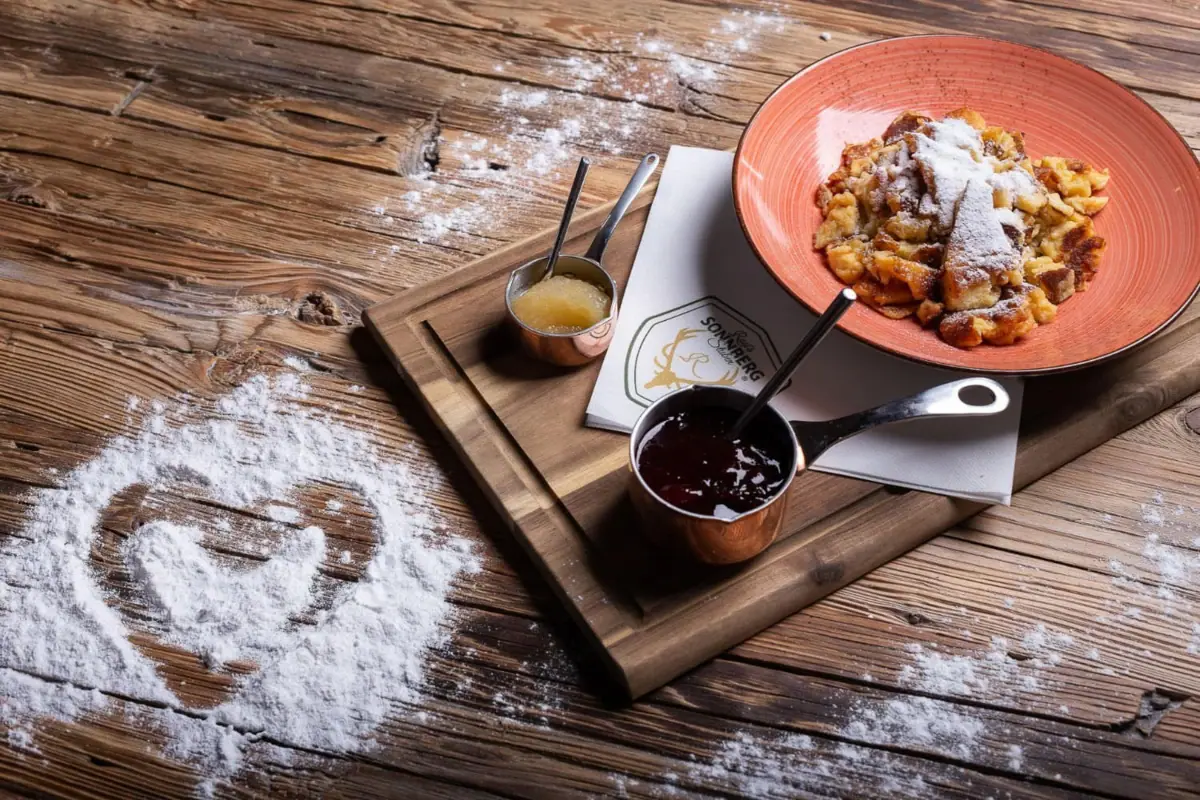 A plate of food on a wooden board.
