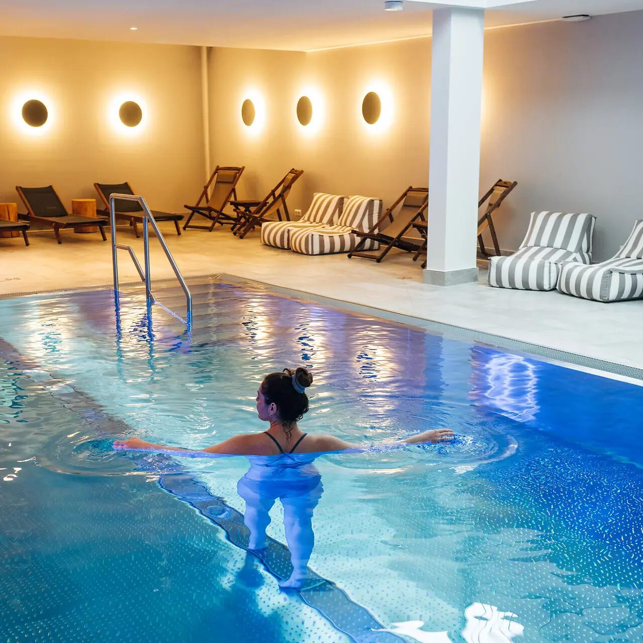 A woman in a swimming pool.