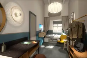 A room with a bed and a chair.